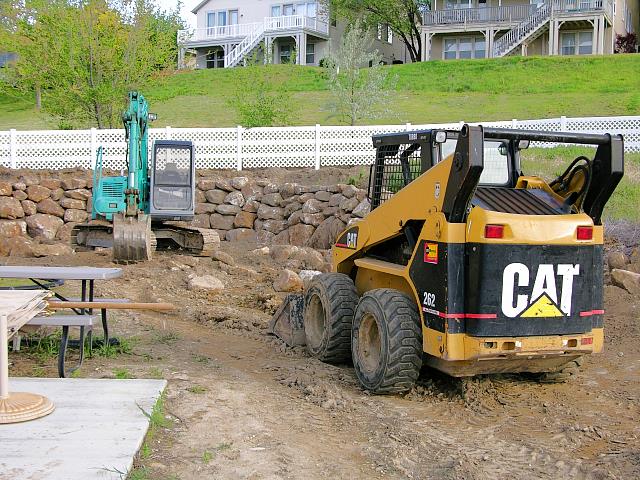 Bobcat and Trackhoe